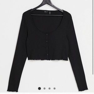 ASOS DESIGN Tall slouchy ribbed button up top
in black